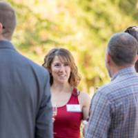 Faculty talking outside